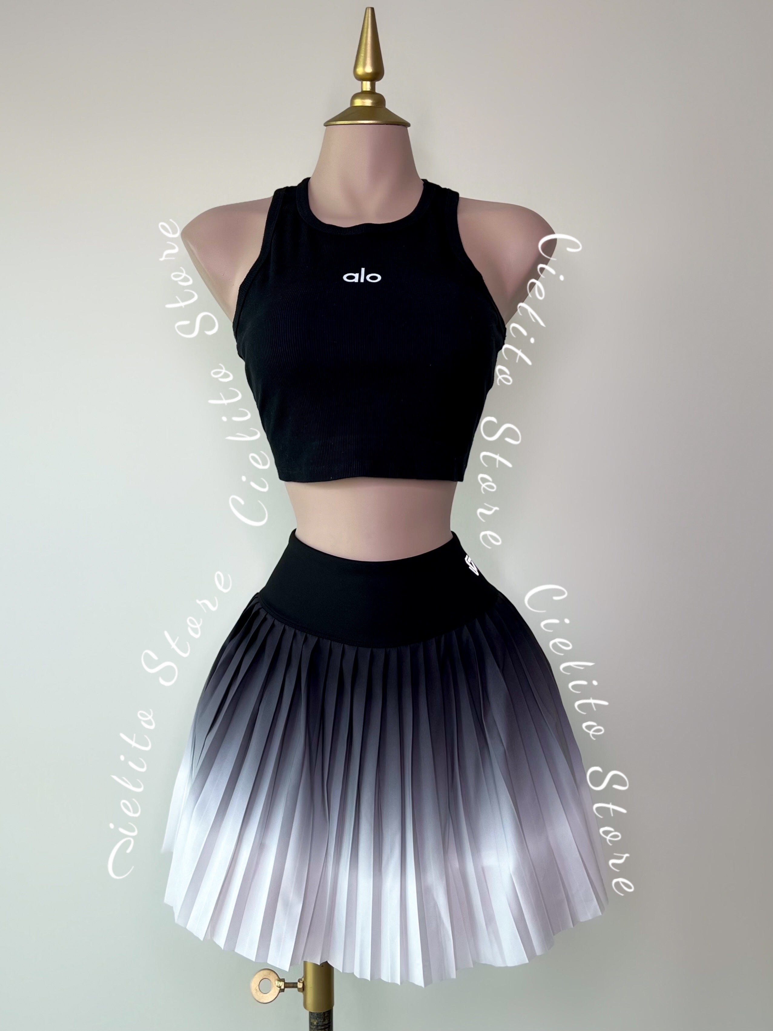 BLUSA NEGRA ALO