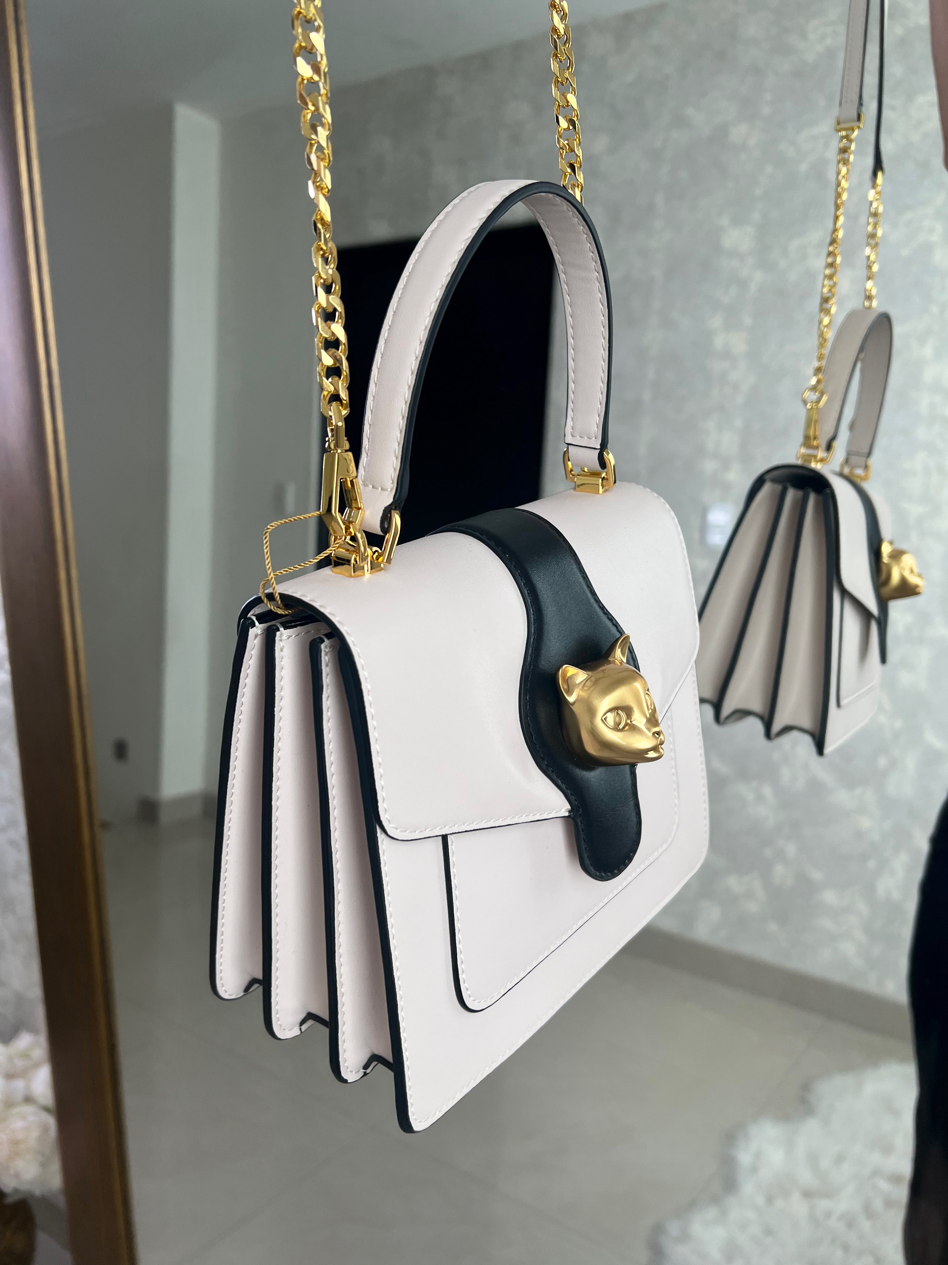 Bolso ivory con detalle dorado
