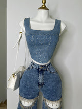 TOP DENIM CON PEDRERIA