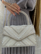 BOLSO DORADO CON PERLA