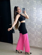 PANTALÓN NEGRO CON VINIPIEL ROSA
