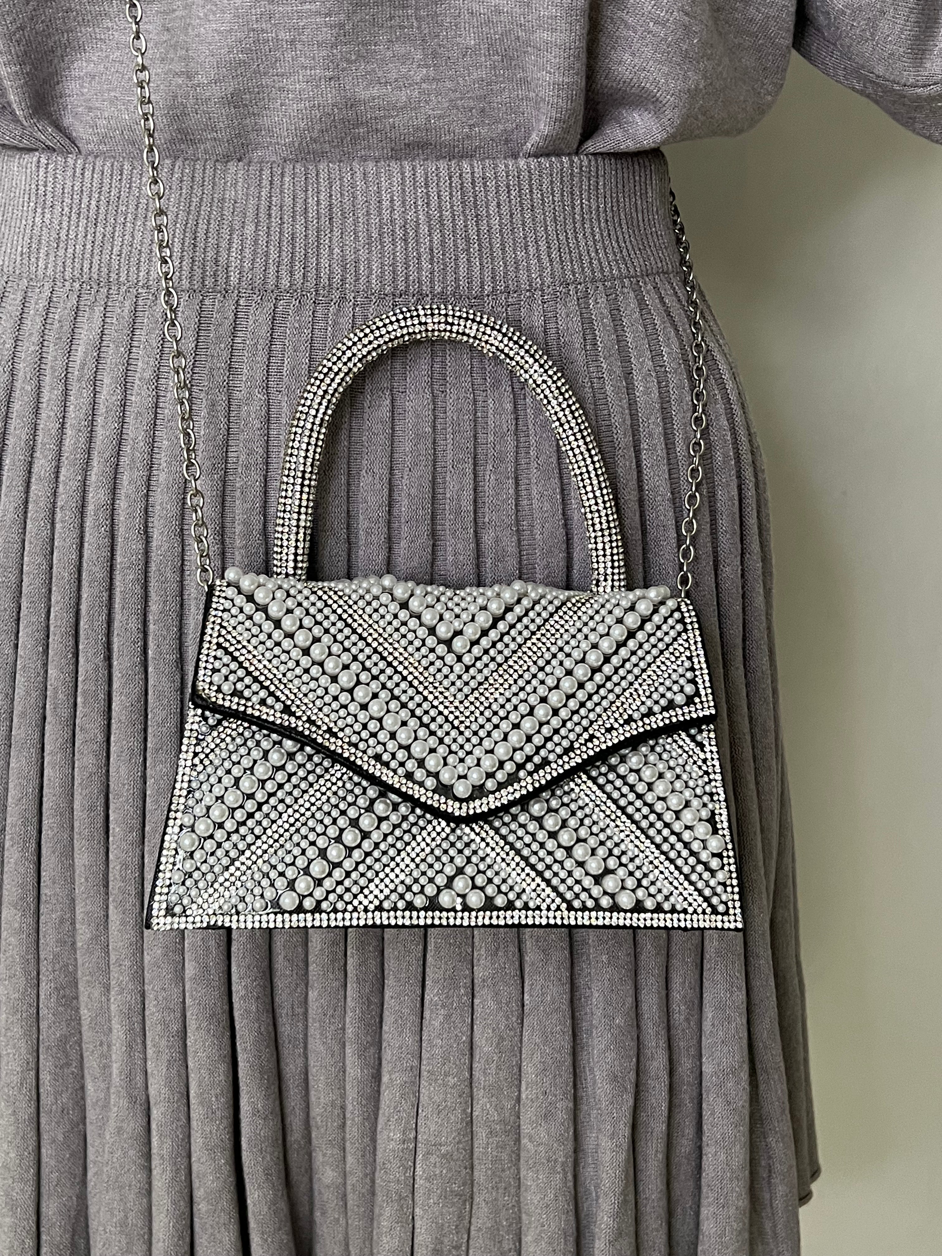 BOLSO NEGRO CON PERLA