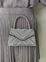 BOLSO NEGRO CON PERLA