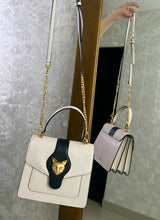 Bolso ivory con detalle dorado