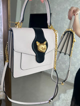 Bolso ivory con detalle dorado