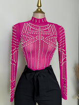 BLUSA ROSA CON PERLAS