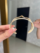 BRAZALETE DORADO CON CURVA