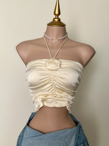 BLUSA SATINADA CON FLOR