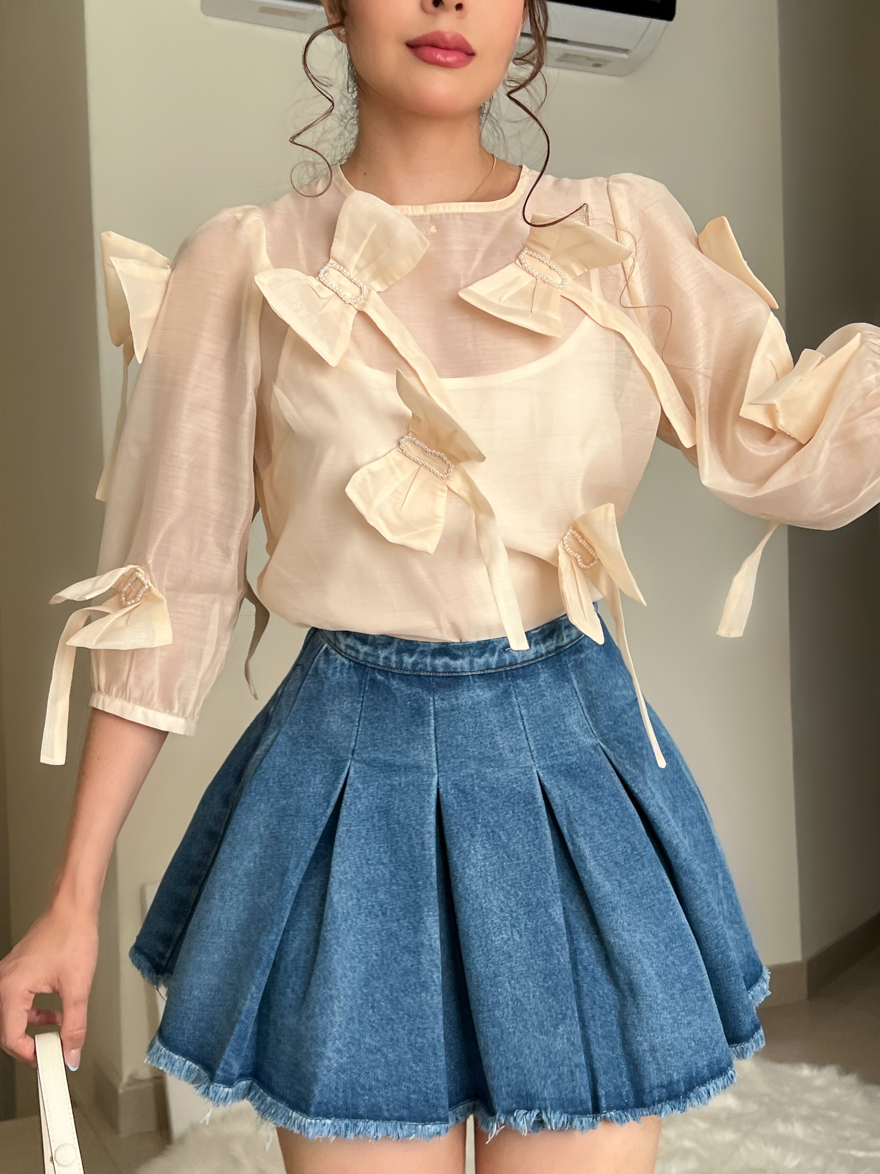 BLUSA IVORY CON MOÑO