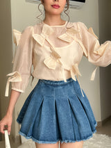 BLUSA IVORY CON MOÑO