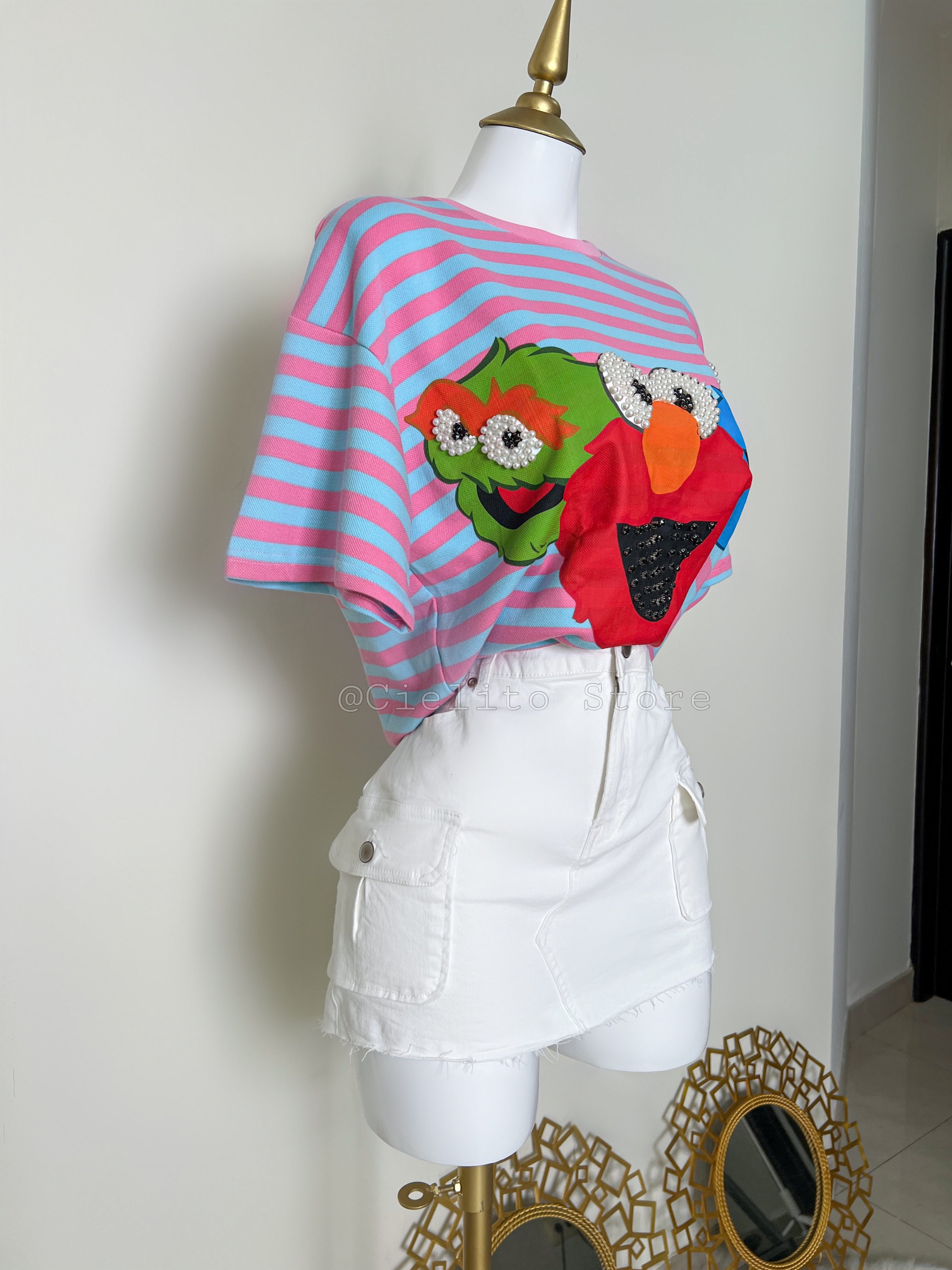 FALDA BLANCA CON BOLSAS