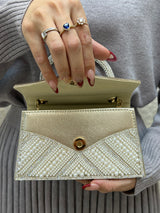 BOLSO DORADO CON PERLA