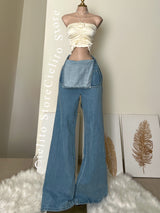 BLUSA SATINADA CON FLOR