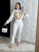 CAMISA BLANCA CON DETALLE DORADO