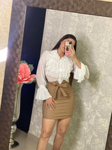 Falda nude con moñito