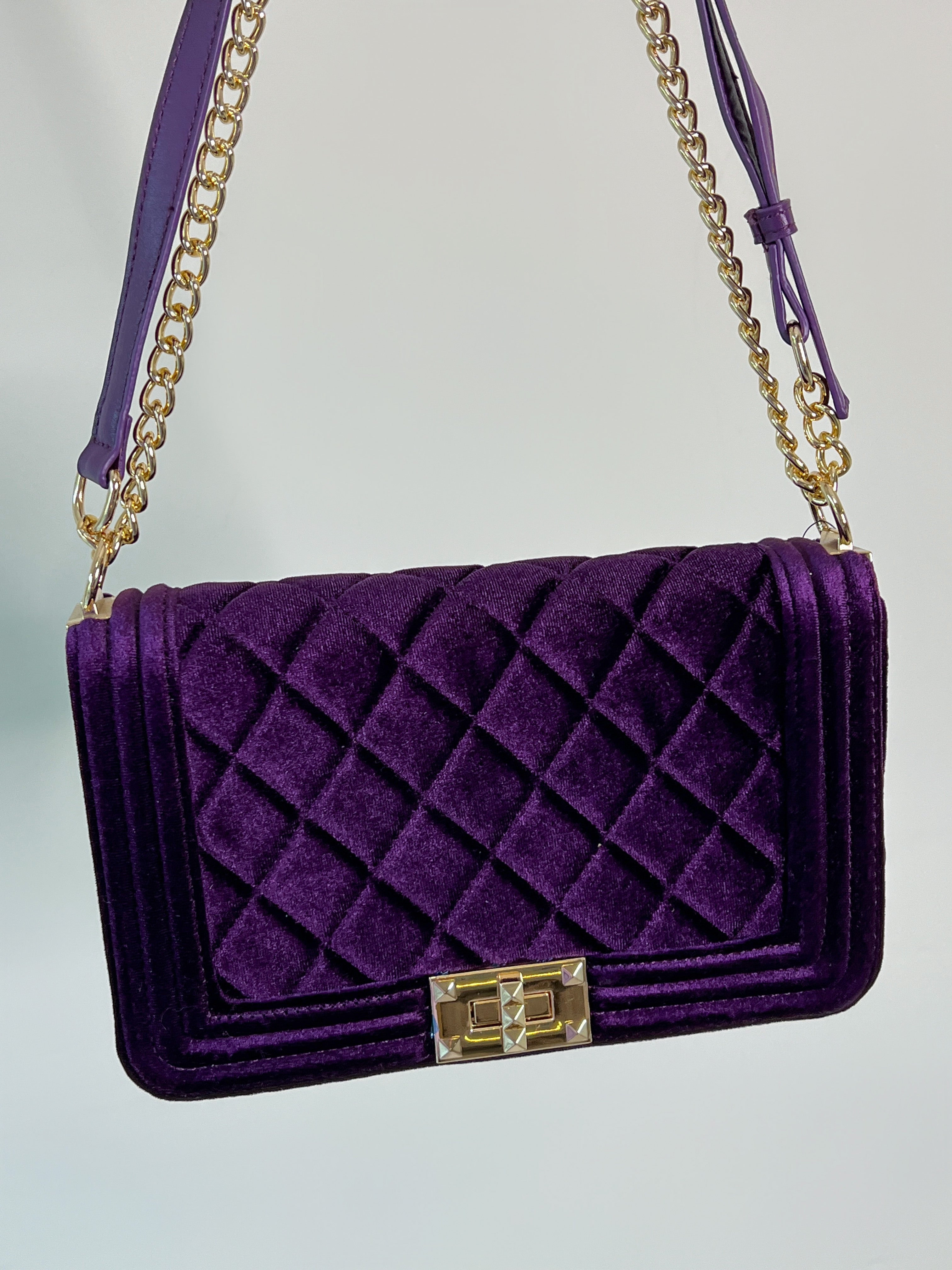 BOLSO LILA CON CORREA