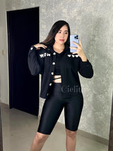 CAMISA NEGRA CON PELUCHITO