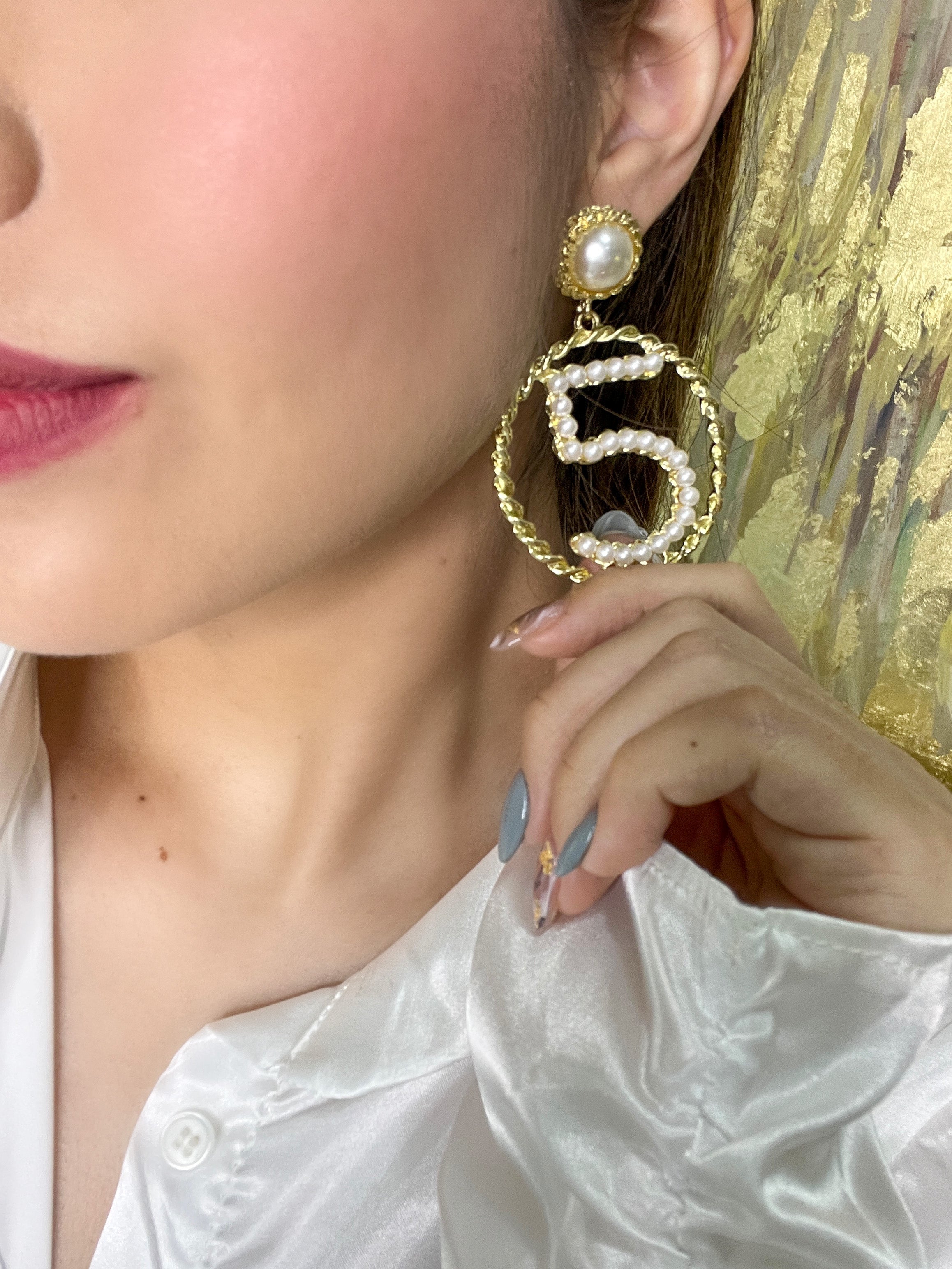 Aretes con perlas blancas