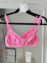 Bralette rosa de perlas