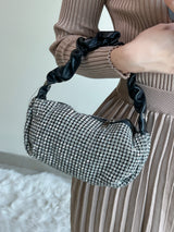 BOLSA NEGRA CON PEDRERÍA