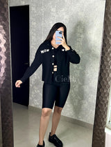 CAMISA NEGRA CON PELUCHITO