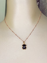 Dije de osito piedra negra