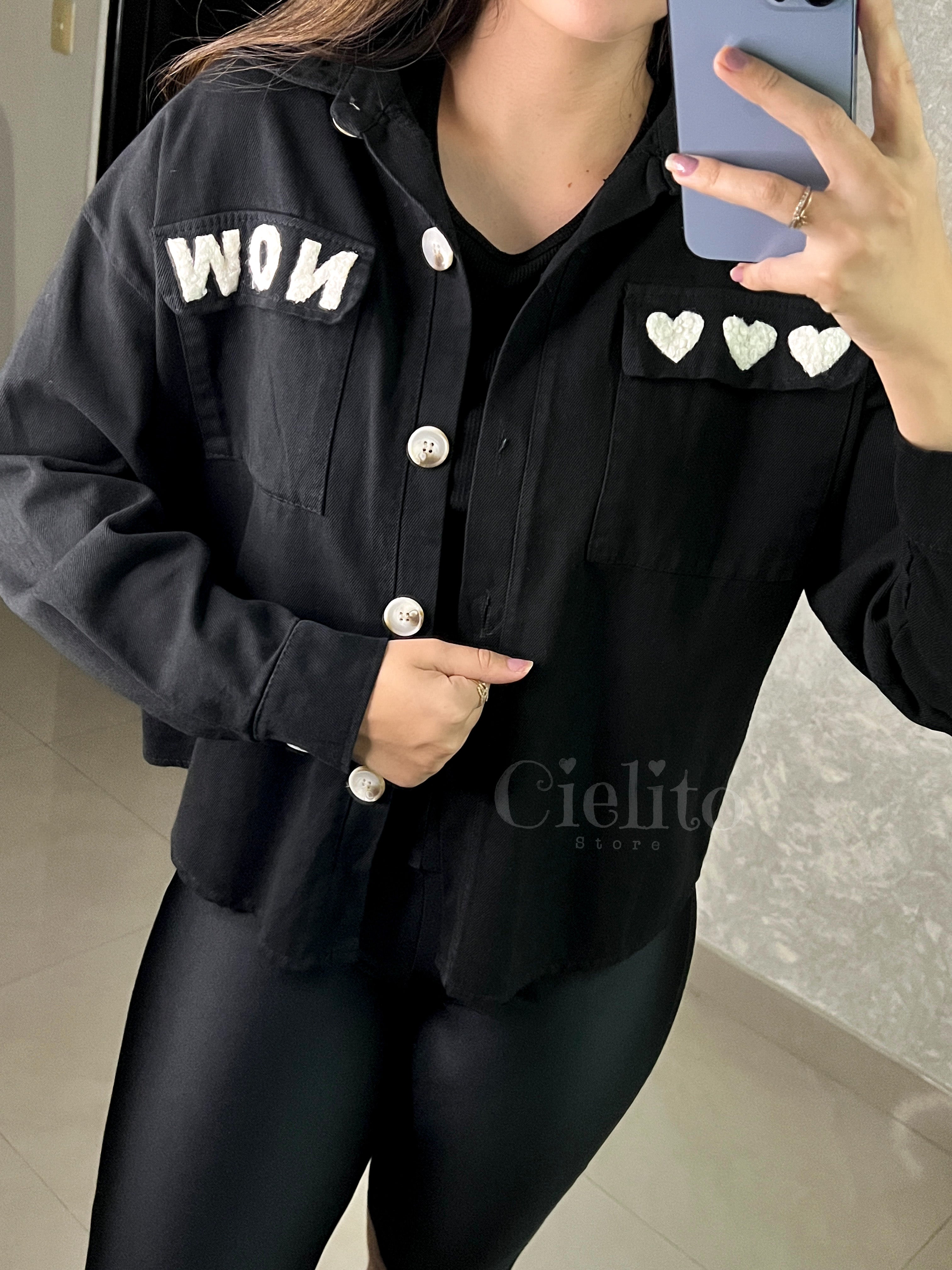 CAMISA NEGRA CON PELUCHITO